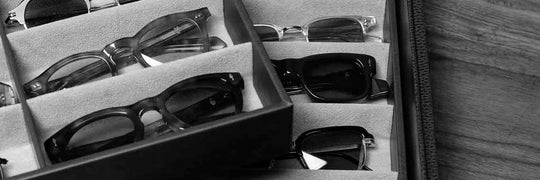 Multiple sunglasses frames inside optical storage box