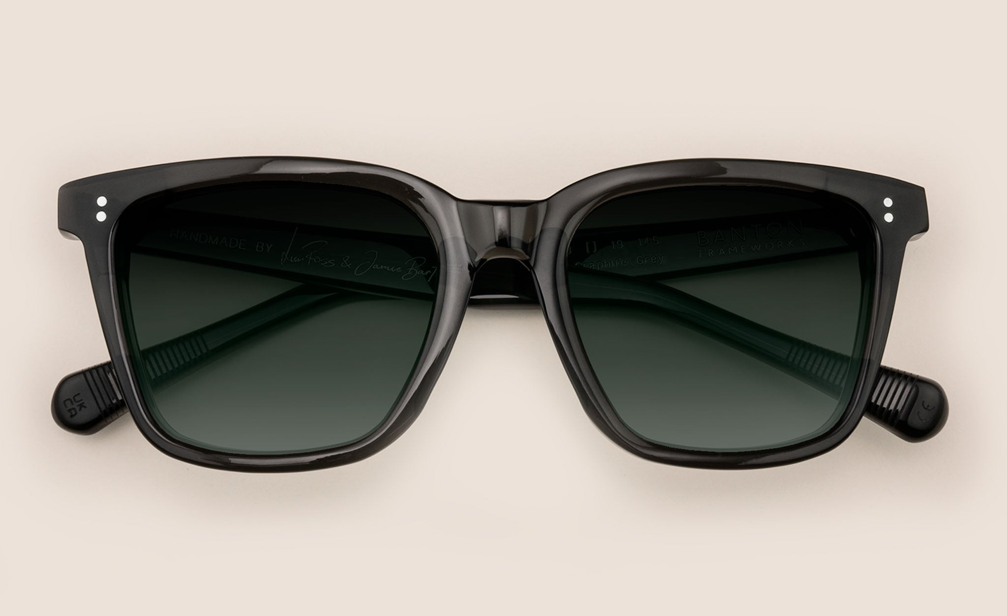 Large square dark grey sunglasses frame